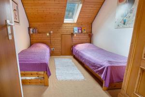 Postel nebo postele na pokoji v ubytování Kuckucksnest