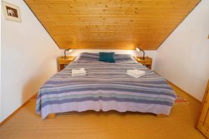Postel nebo postele na pokoji v ubytování Kuckucksnest