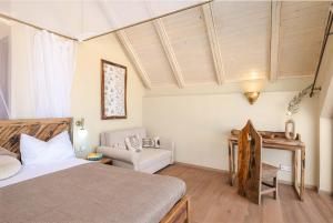 Postel nebo postele na pokoji v ubytování Clove Island Essence & Spa