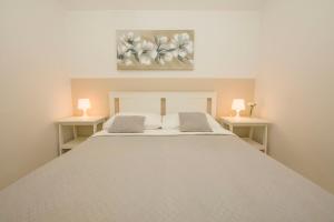 Posteľ alebo postele v izbe v ubytovaní Apartments Josip