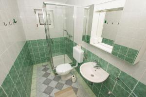 Kúpeľňa v ubytovaní Apartments Josip + 35 fotografií
