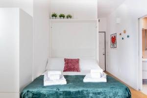 Voodi või voodid majutusasutuse Design Suite 39 - Metropolitana M4 - Aeroporto Linate toas