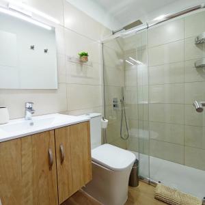 Et badeværelse på Cozy-Central Apartment4