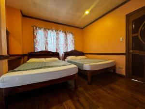 Fotografie z fotogalerie ubytování VisiTours Nook Moalboal Guest House v destinaci Moalboal