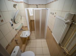 Koupelna v ubytování Meduza ośrodek wczasowy