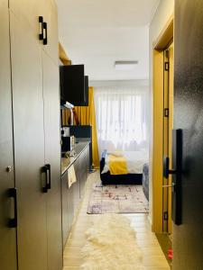 a room with a bedroom with a bed and a window at Kozy Homes in Nairobi