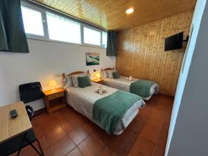 Ein Bett oder Betten in einem Zimmer der Unterkunft Pensión Codesal