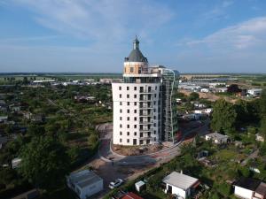 an overhead view of a white building with a tower at Exklusives Wohnen im historischen Wasserturm dem Highlight von Delitzsch WE317 in Delitzsch