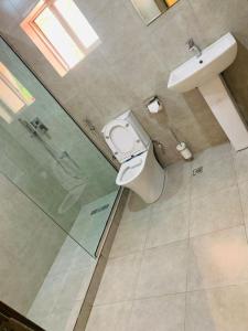 Koupelna v ubytování Swiss Pearl Continental Suite