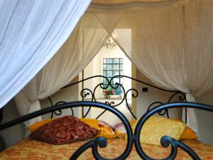 Postel nebo postele na pokoji v ubytování Villa Ceppeto, Best Of Tuscany at Brand New Arches