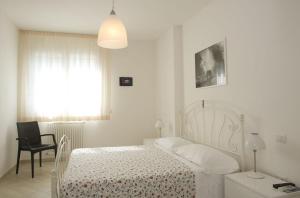 Letto o letti in una camera di Camera & Caffè Cenni