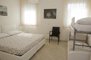 Letto o letti in una camera di Camera & Caffè Cenni