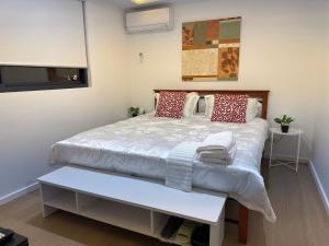 Ένα ή περισσότερα κρεβάτια σε δωμάτιο στο Chadstone Holiday Village Plus