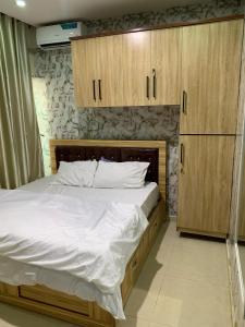 Postel nebo postele na pokoji v ubytování Xplode Residence + 5 fotografií