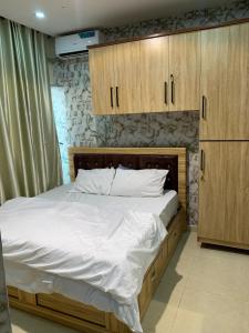 Postel nebo postele na pokoji v ubytování Xplode Residence
