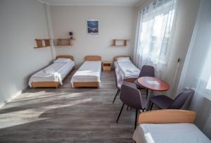 Postel nebo postele na pokoji v ubytování Meduza ośrodek wczasowy