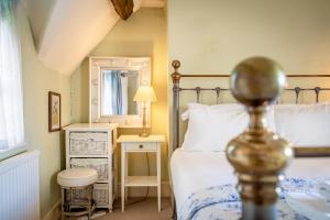 a bedroom with a bed and a mirror at Music House in York