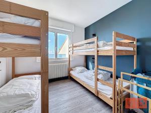 Posteľ alebo postele v izbe v ubytovaní Les Petits Moussaillons