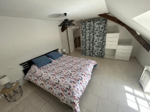 Łóżko lub łóżka w pokoju w obiekcie Manoir de la Frazelière - Gîte au cœur des châteaux de la Loire
