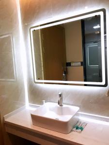 Koupelna v ubytování Longxiang intelligent Hotel