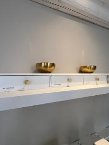 two bowls on a shelf in a room at Vanessa Home in Burano +31 photos