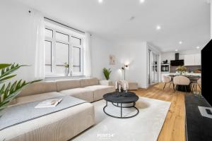 Η κουζίνα ή μικρή κουζίνα στο Kurzzeitwohnung Stadtwohnung Heiligenhafen +25 φωτογραφίες