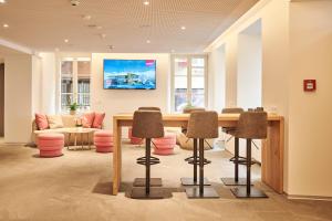 TV a/nebo společenská místnost v ubytování Aparthotel Krone - Self Check-In