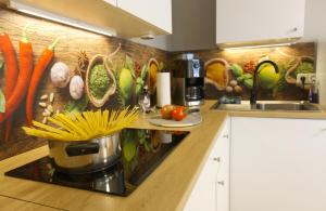A cozinha ou kitchenette de Ferienwohnung Storchennest
