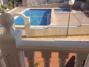 a view of a swimming pool from a balcony at Casa Lucero in Rojales