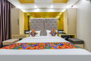 Ένα ή περισσότερα κρεβάτια σε δωμάτιο στο FabHotel Grand Palazzo Near Paschim Vihar