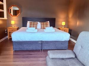 Letto o letti in una camera di Argyll Hotel