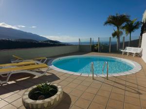 Bazén v ubytování Vista Hermosa 4 nebo v jeho okolí