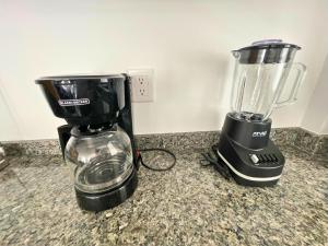 Příslušenství pro přípravu čaje a kávy v ubytování Depa Familiar Céntrico GDL con Estacionamiento