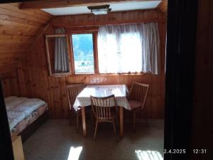 Postel nebo postele na pokoji v ubytování Chata Všemily