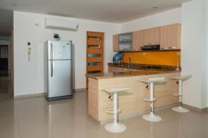 Kuchyň nebo kuchyňský kout v ubytování Hermoso Apartamento Frente al Mar 3 Habitaciones B62 + 14 fotografií