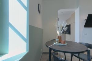 TV a/nebo společenská místnost v ubytování Cà del Lasco - Modern Apartments in Classic Villa
