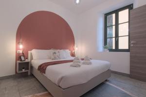 Postel nebo postele na pokoji v ubytování Cà del Lasco - Modern Apartments in Classic Villa