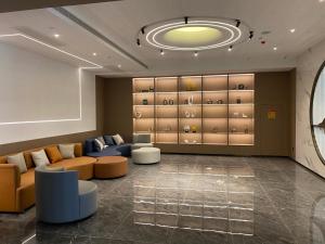 Prostor za sedenje u objektu 沃德酒店济南经十东路融创文旅城店