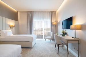 Postel nebo postele na pokoji v ubytování Hotel Gerardus + 37 fotografií