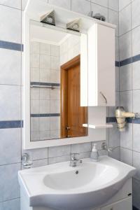 Koupelna v ubytování Hotel Alexandros