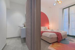 Postel nebo postele na pokoji v ubytování Cà del Lasco - Modern Apartments in Classic Villa