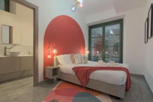 Postel nebo postele na pokoji v ubytování Cà del Lasco - Modern Apartments in Classic Villa