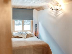 Rúm í herbergi á Mys Chalet