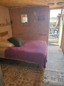 Postel nebo postele na pokoji v ubytování Au relais des migrateurs