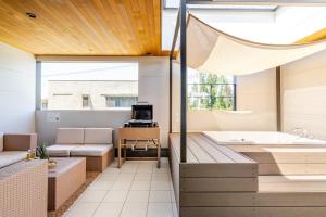 TV/trung tâm giải trí tại Kokoni chill house
