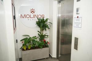 a sign for a mulsosarmaarmaarmaarmaarmaarmaarmaarmaarma at Hotel Molinos Plaza in Medellín