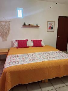Postel nebo postele na pokoji v ubytování Casa Jardín