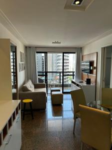 Χώρος καθιστικού στο Flat Atlântico Neto