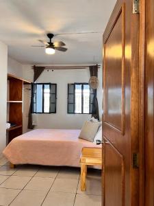 Postel nebo postele na pokoji v ubytování Casa Jardín