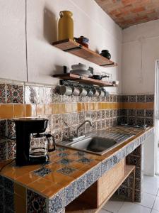 Kuchyň nebo kuchyňský kout v ubytování Casa Jardín
